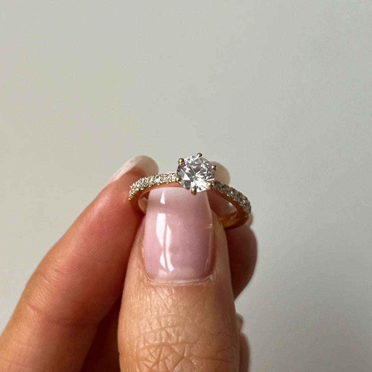 Solitaire Ring with Diamond Band